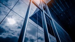 Modern architecture building's windows with sun reflection