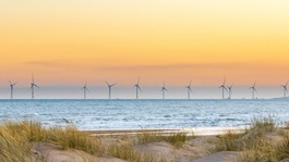 Offshore-windfarm-with-sand-dunes-in-the-foreground