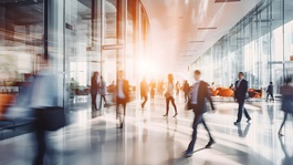 workplace-with-people-in-walking-in-blurred-motion-in-modern-office-space_AdobeStock_714071973