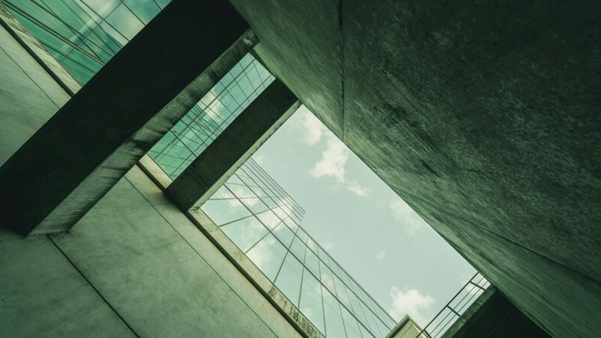bottom-view-modern-glass-office-building