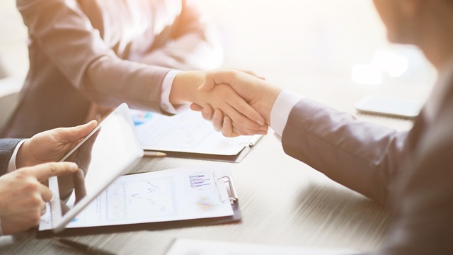 Two people shaking hands