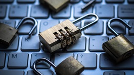 Keyboard with three padlocks on it